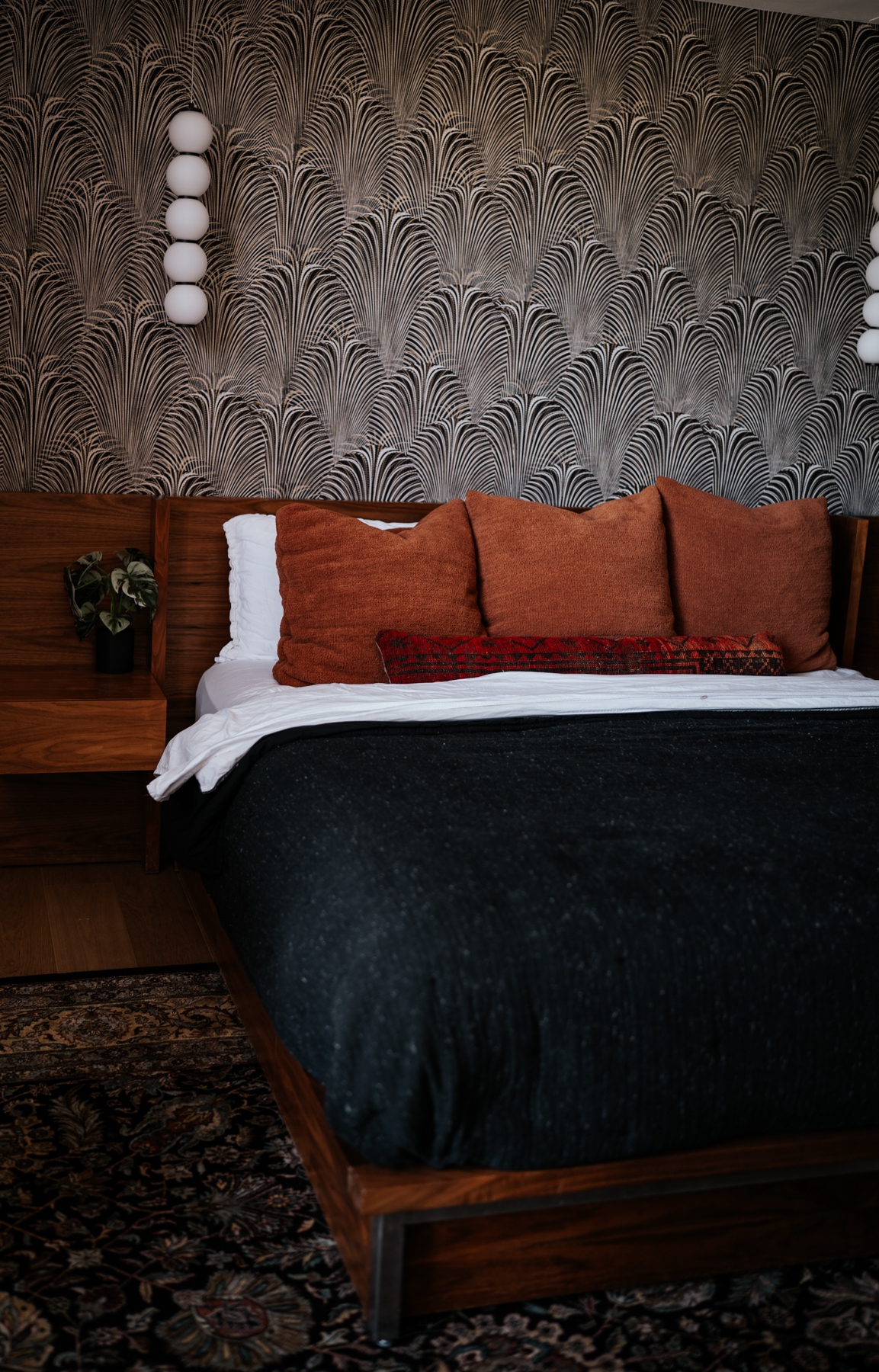 Custom curtains paired with statement wallpaper in a mid-century family home, Encino California